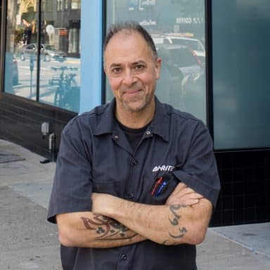 Sam standing outside of Bi-Rite Market Polk St