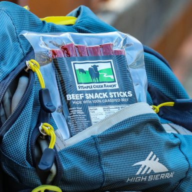 Backpack Open To Reveal Grass Fed Non Gmo Beef Sticks