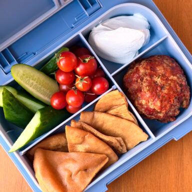 Blue Lunch Box With Compartments With Veg Meatball Pita And Dip